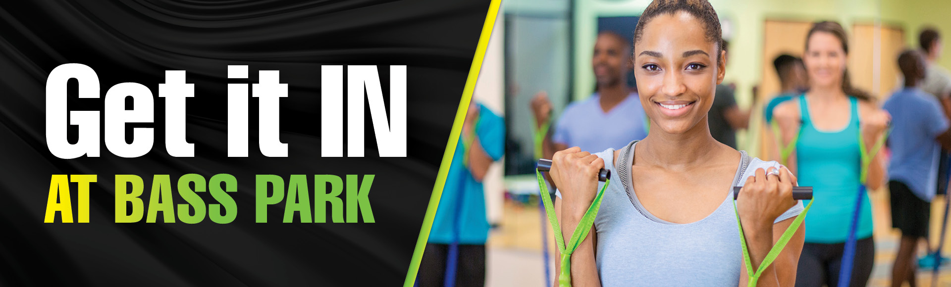 Get it In at Bass Park. Photo of young women using resistance bands in a group exercise class with people behind her.